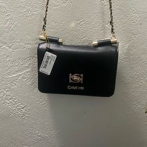 Bebe, Alex Crossbody, Black Purse with traditional clasp new with tags